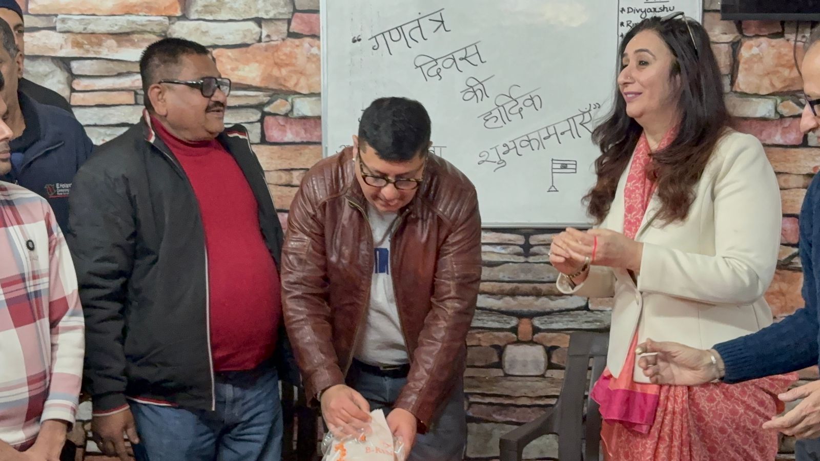 A patient receiving a one-year sobriety recognition at SimranShri